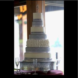 Grey and cream wedding cake with bling ribbon